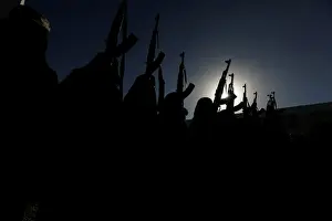 Security Prints: Women loyal to the Houthi movement hold up rifles as they attend a gathering to show