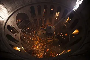 Images Dated 2012 April: Worshippers hold candles as they take part in the Christian Orthodox Holy Fire ceremony